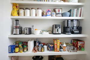 Built-in open shelving providing extensive storage