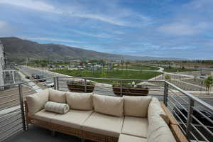 Spacious outdoor balcony with horizontal metal railings