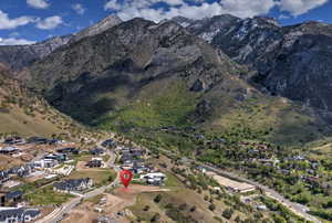 Mountainous terrain with partial snow cover
