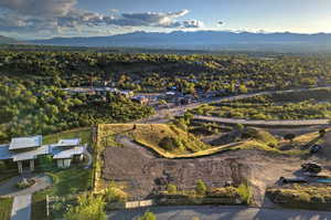 Expansive undeveloped lot featuring graded terrain and a prominent slope