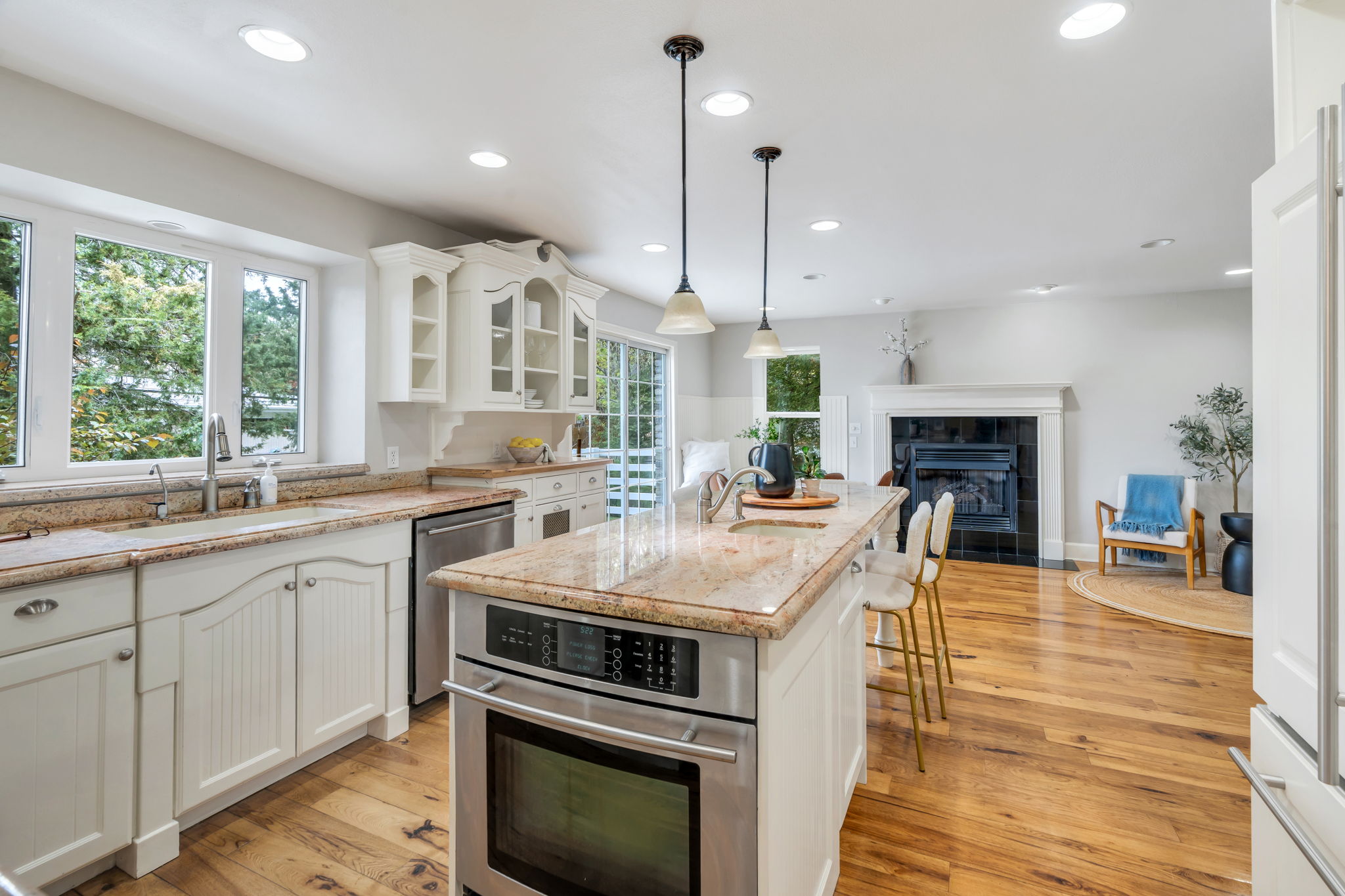 Large island and glass-front cabinets