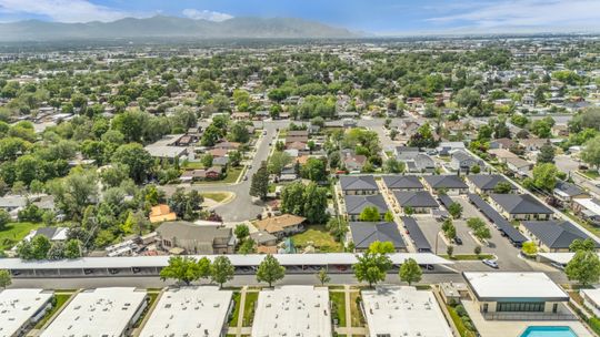 Aerial perspective showcasing a residential community with mature landscaping