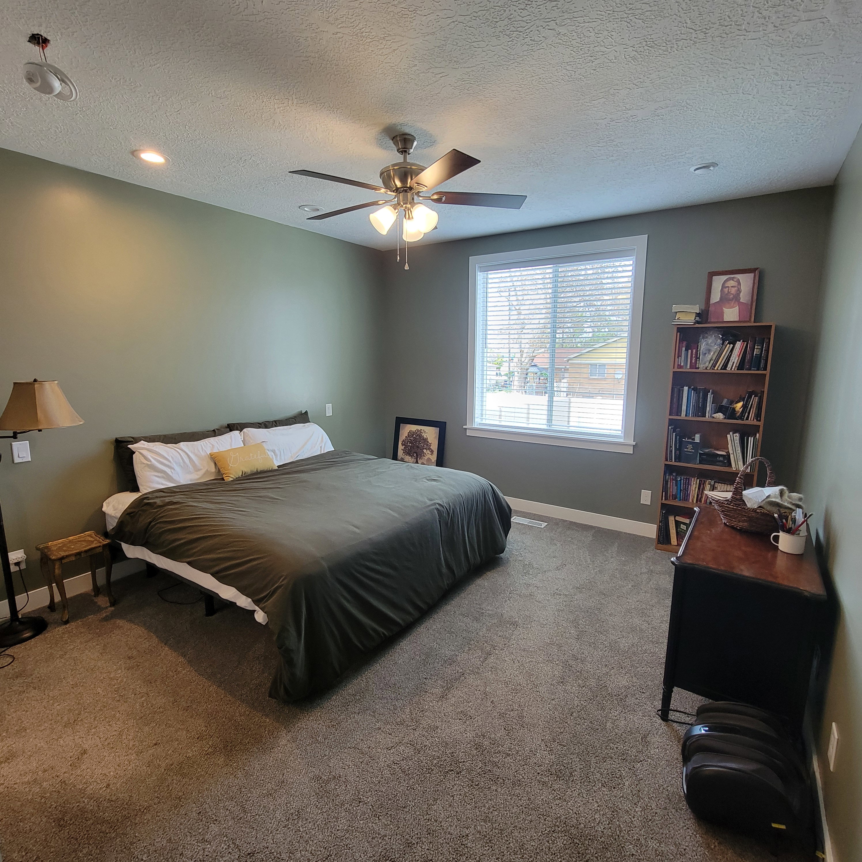 Spacious room featuring carpeting, a ceiling fan with integrated lighting, and recessed ceiling lights