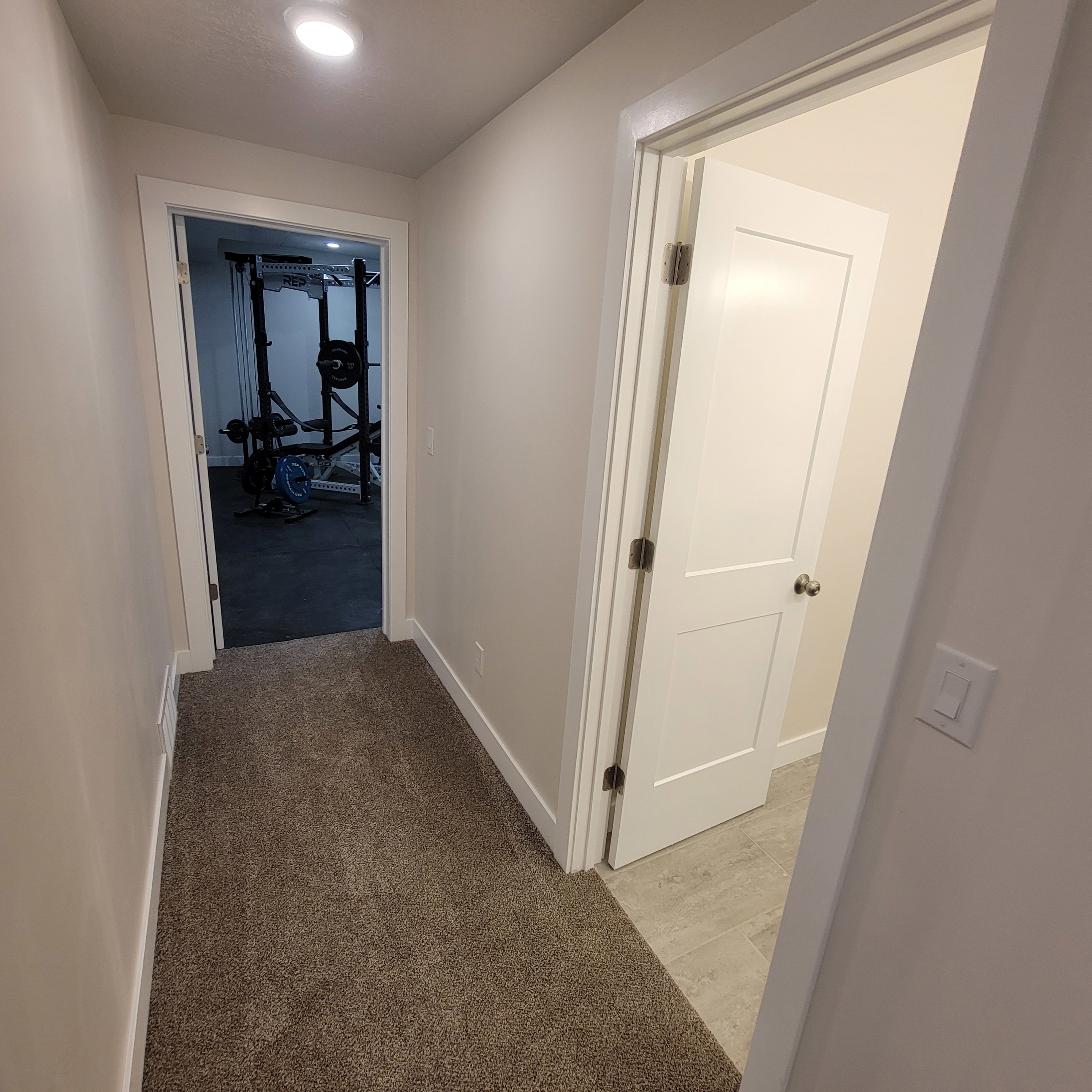 Hallway featuring carpet flooring and recessed lighting