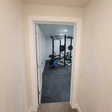 Dedicated room featuring recessed lighting and durable rubber flooring
