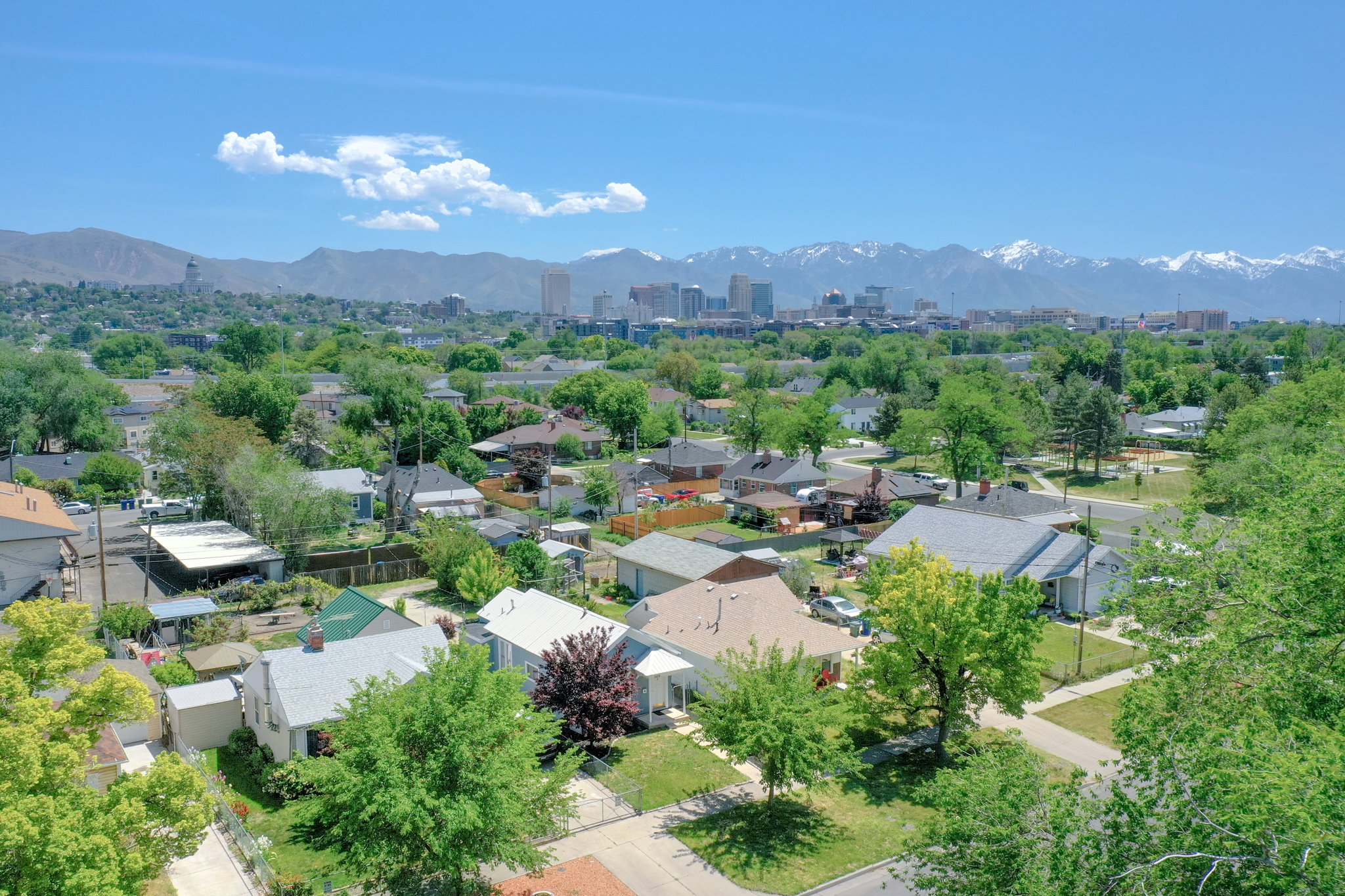 Aerial perspective showcasing a residential area with varied housing styles