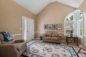 Guest suite with outdoor access and vaulted ceilings