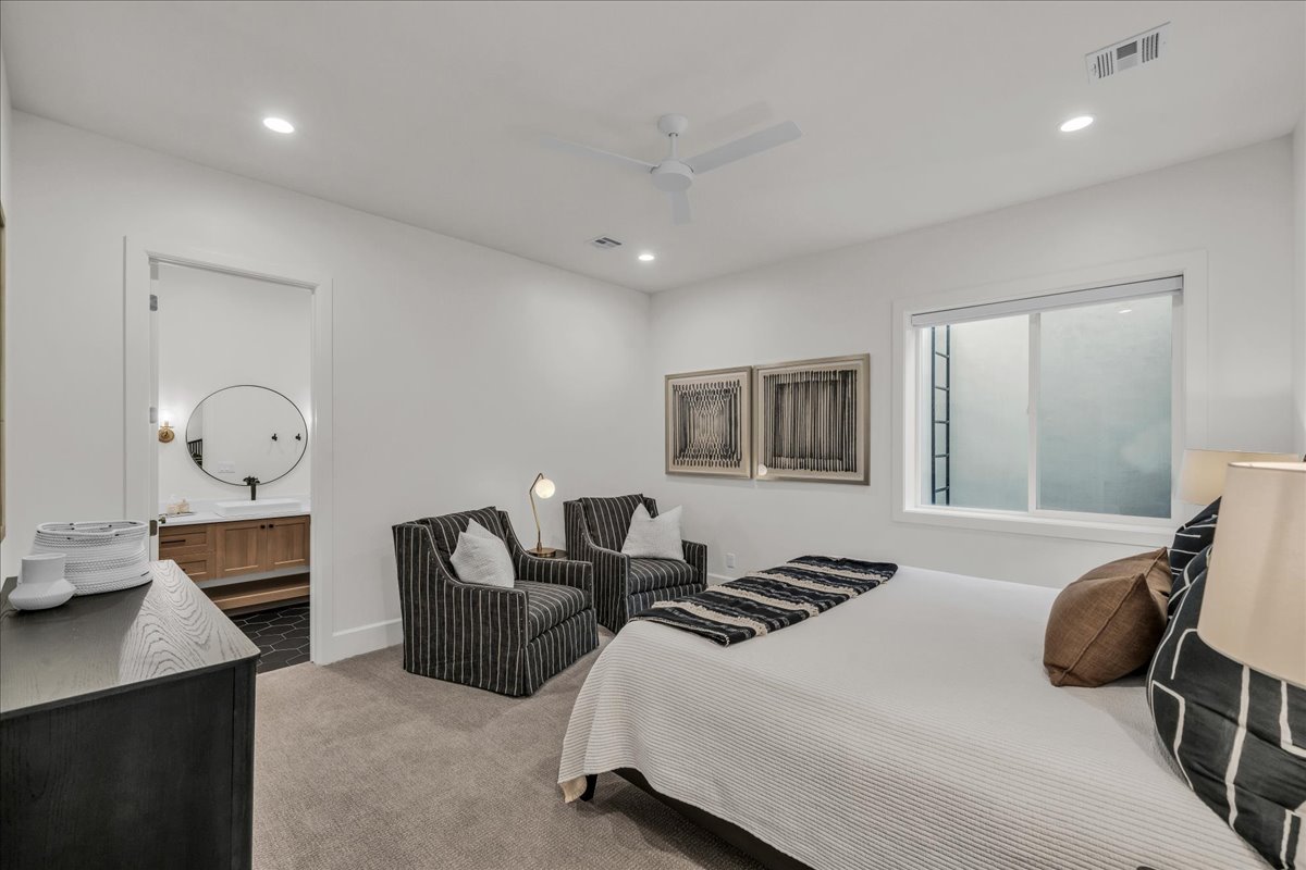 Bedroom featuring carpet flooring, recessed lighting, and a ceiling fan
