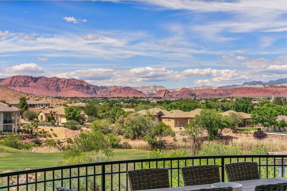 Expansive desert landscape with red rock formations - view from the upper deck
