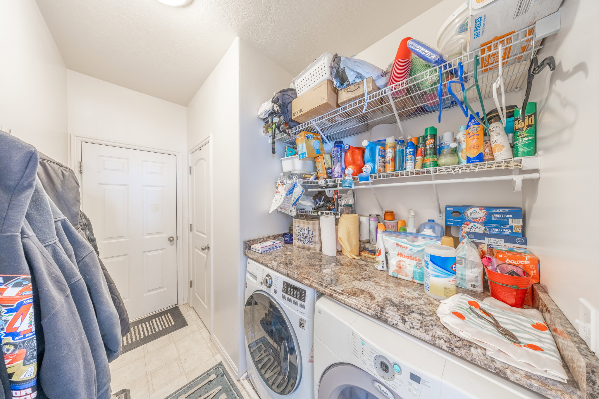 Laundry area and walk out door to garage