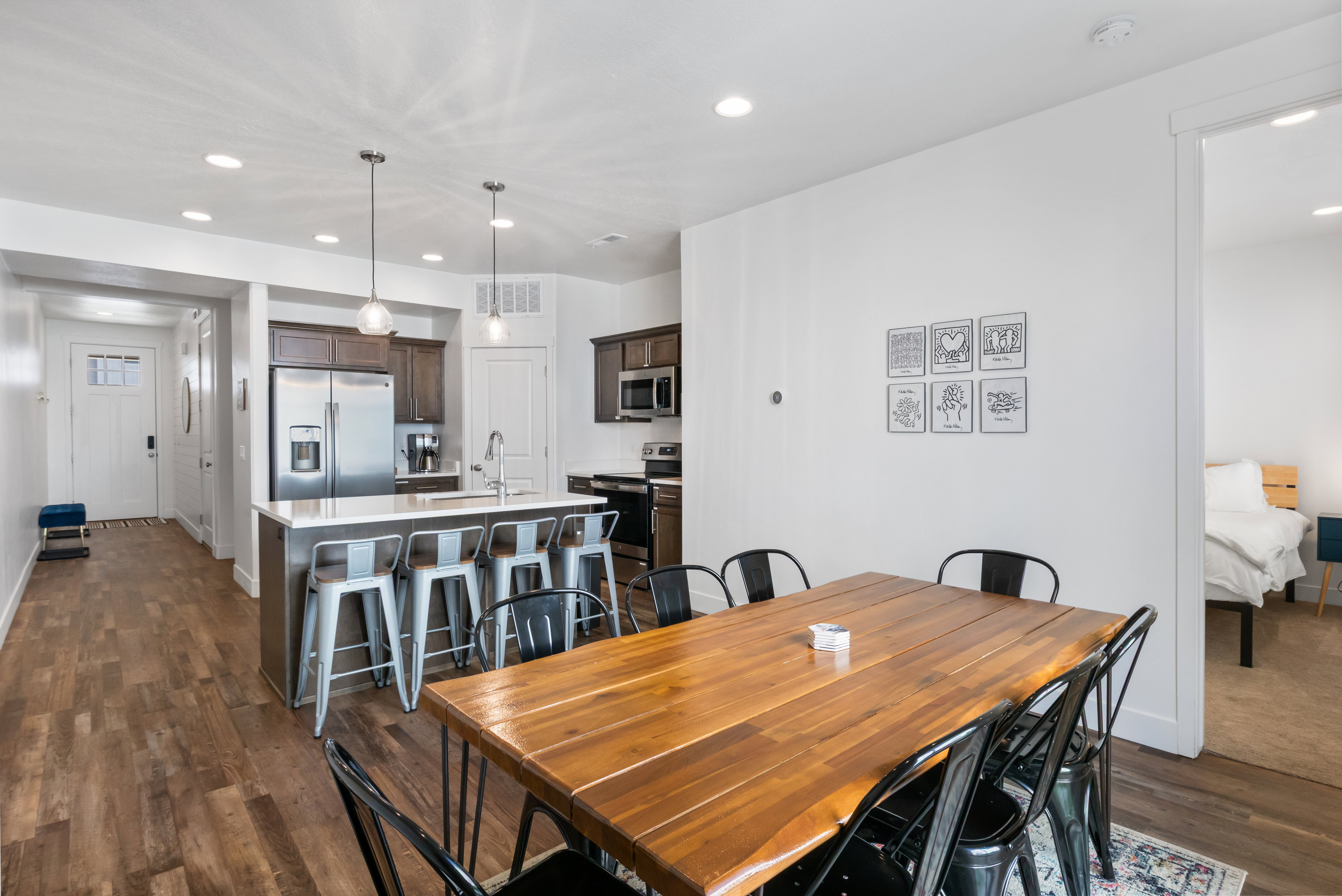 Open-concept space featuring wood-finish flooring