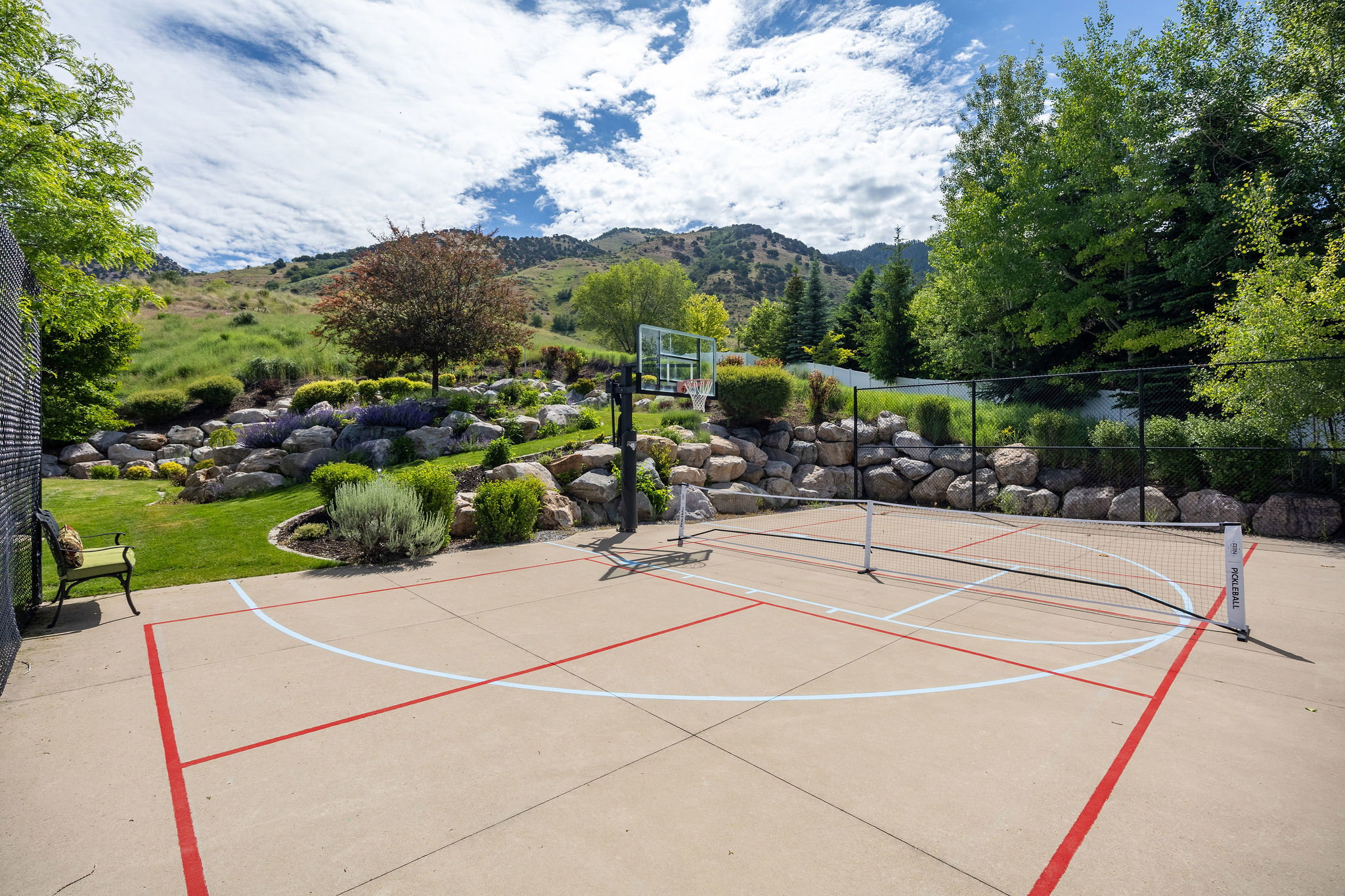 Multi-purpose sports court featuring concrete surfacing and painted court lines