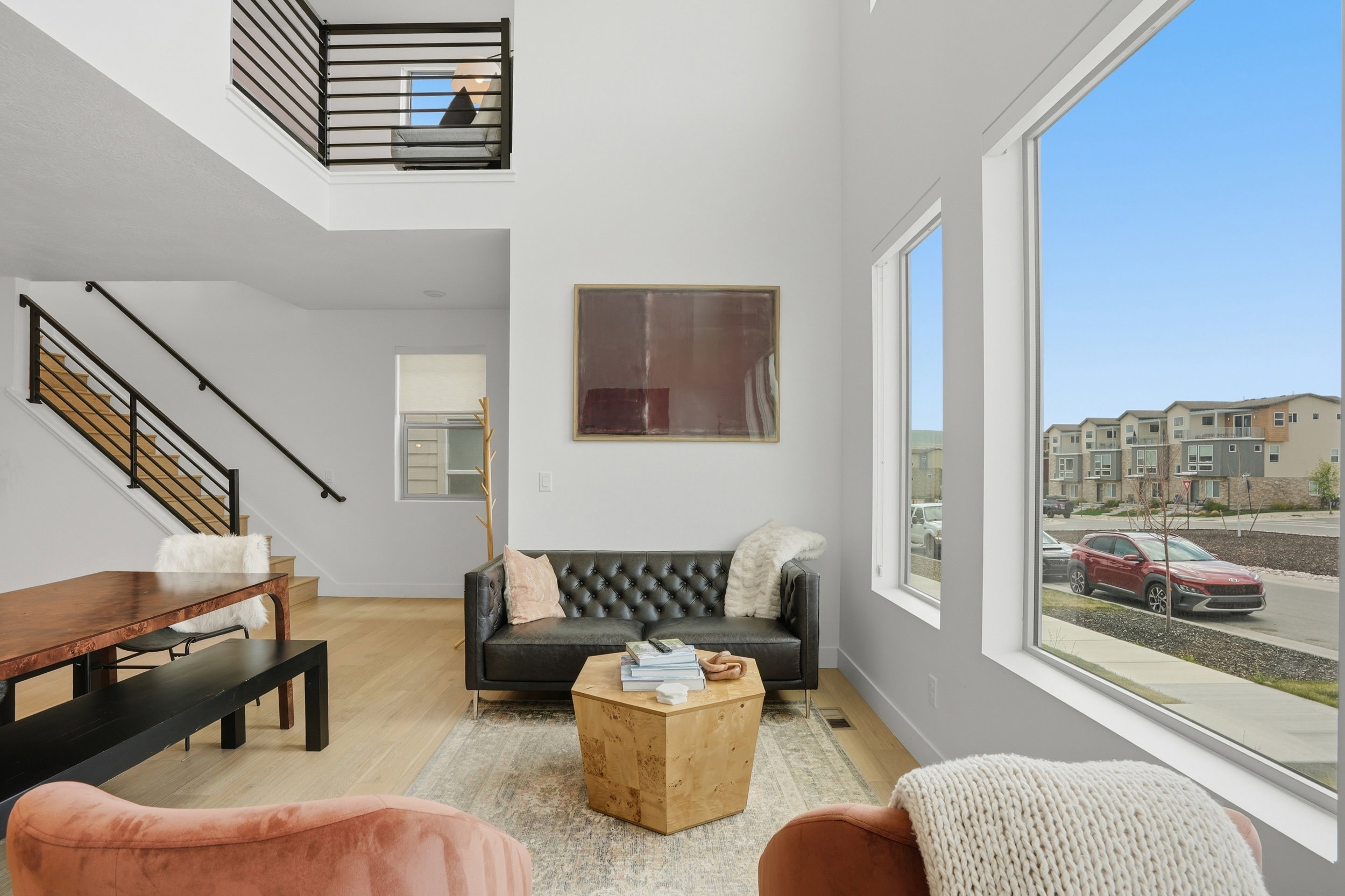 Vaulted ceilings and abundant natural light highlight this open living area