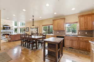 Open-concept living space with wood-finish flooring