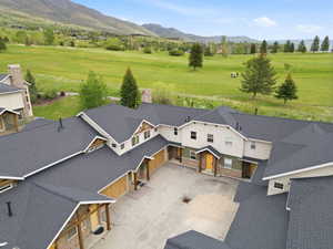 Multi-unit complex featuring an asphalt shingle roof