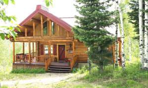 The cabin is constructed of beautiful hand scraped and hand fitted logs, retaining the natural characteristics of the wood.
