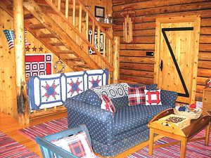 The great room and main floor have pine plank flooring.