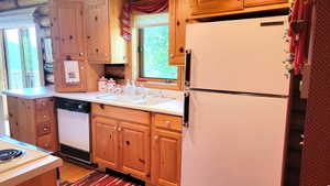 Kitchen view 6: West wall of the kitchen with beautiful casement window  and great views!