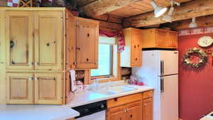 Kitchen view 5: The pine hutch opens from 2 sides with storage below.