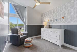 Bedroom with vaulted ceiling with ceiling fan