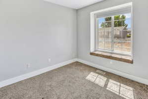 Large multi-pane window with a carpeted sill