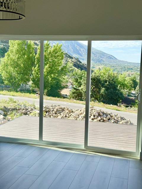Sliding glass door system opening to an exterior deck