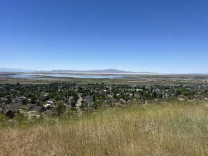 Expansive horizon featuring a body of water and distant mountains
