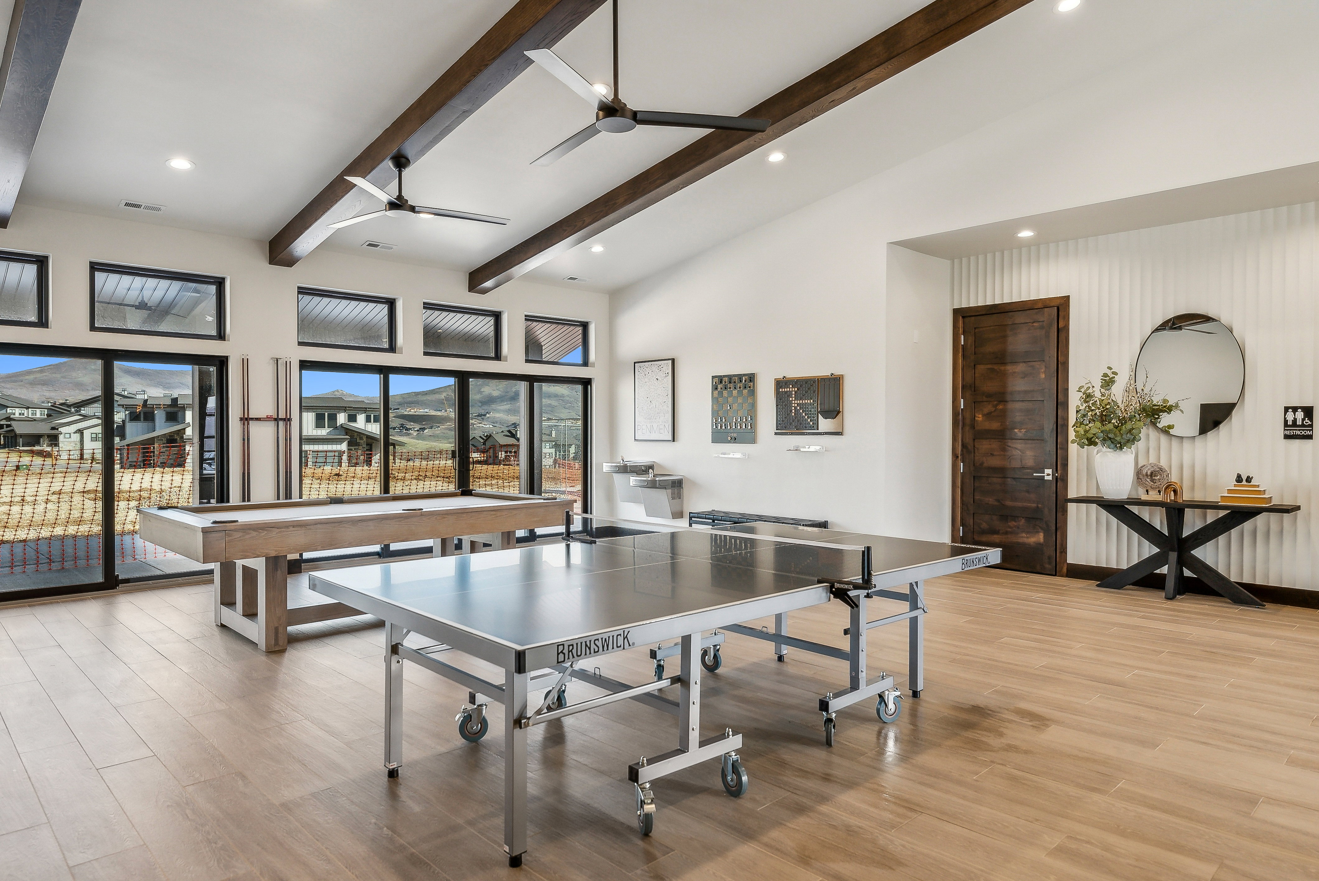 Spacious interior with vaulted ceilings and exposed wood beams