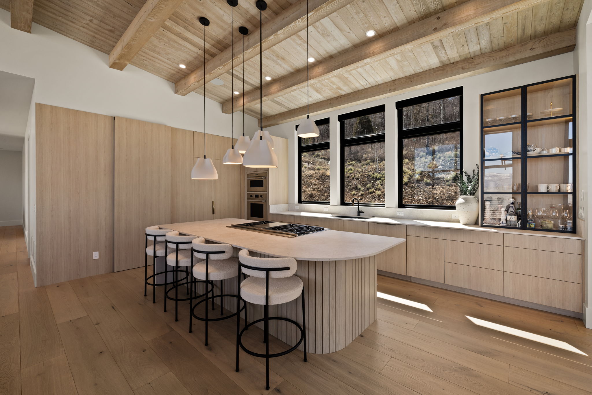Vaulted wood-paneled ceiling with exposed beams