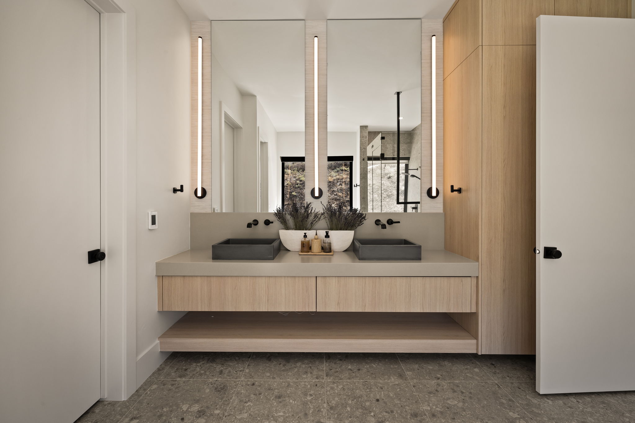 Floating dual vanity with integrated countertop and two undermount sinks