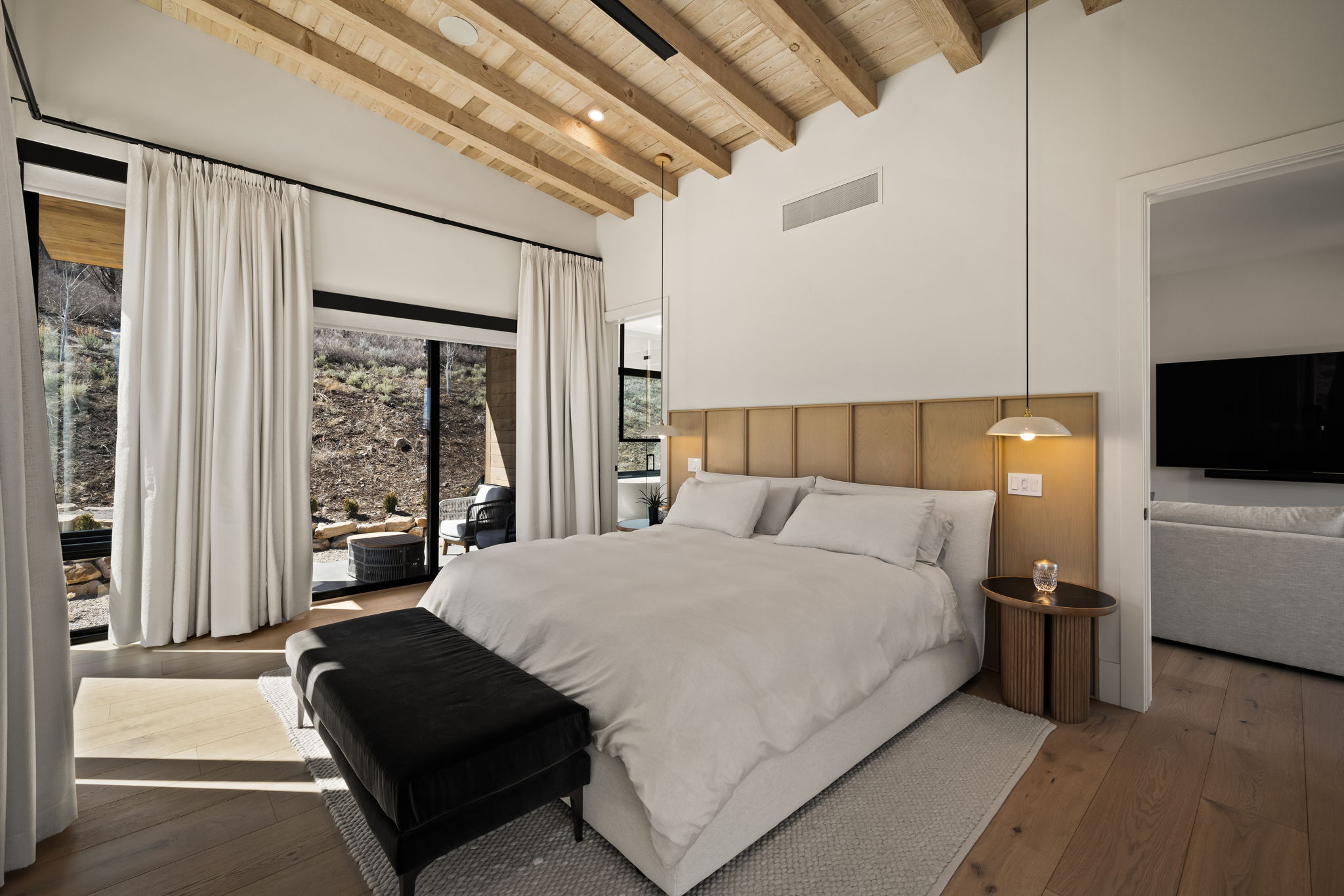 Vaulted wood-beam ceiling with exposed joists