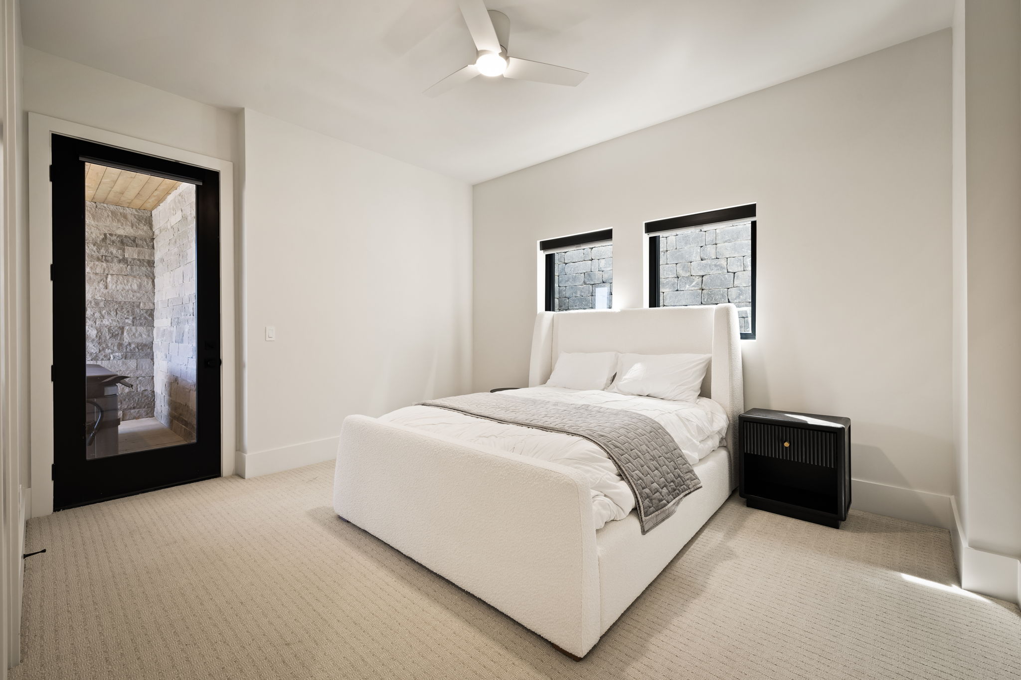 Textured light-colored carpeting throughout