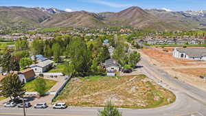 Expansive undeveloped lot presenting opportunities for new construction