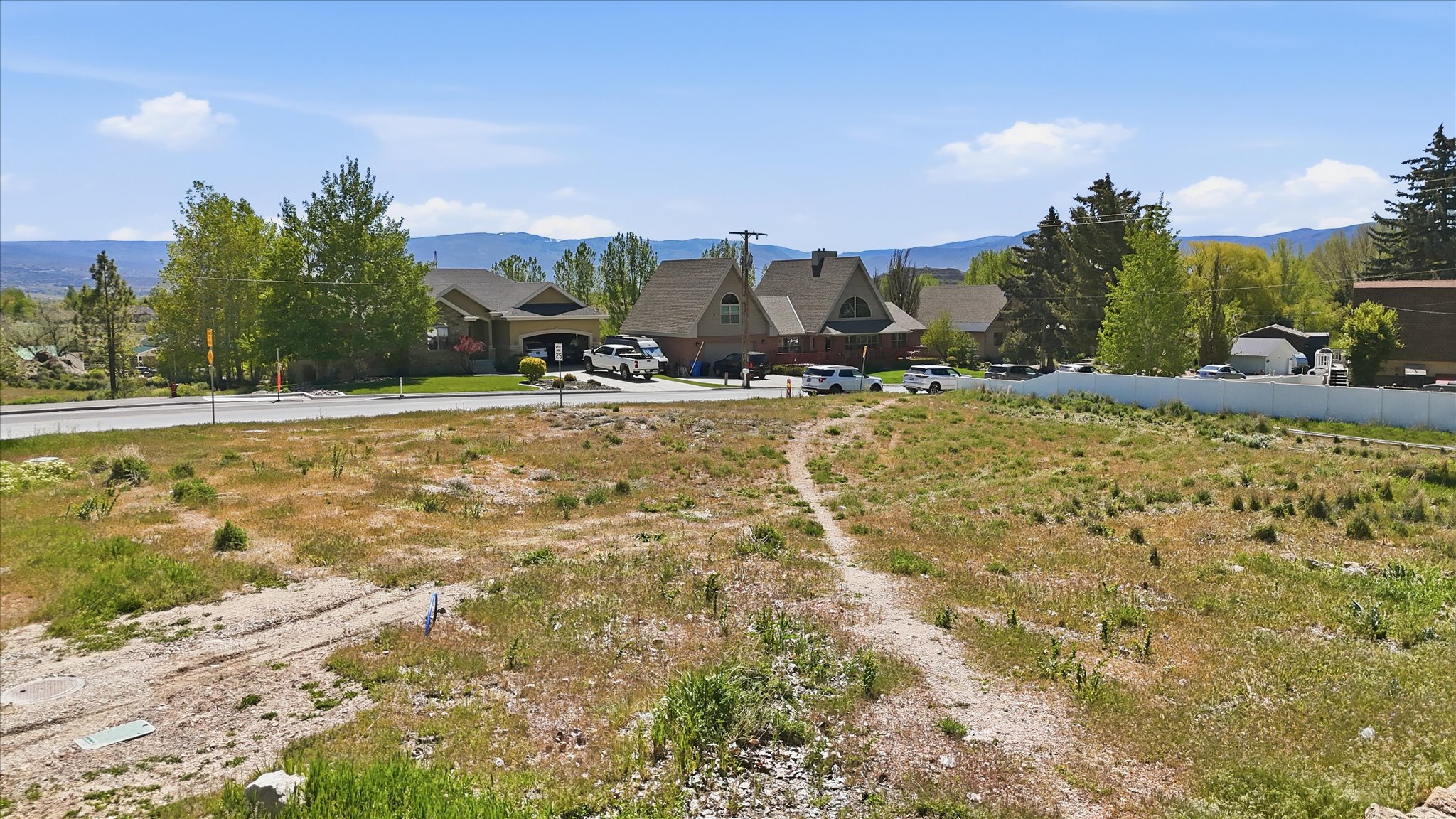 Expansive undeveloped lot with natural vegetation