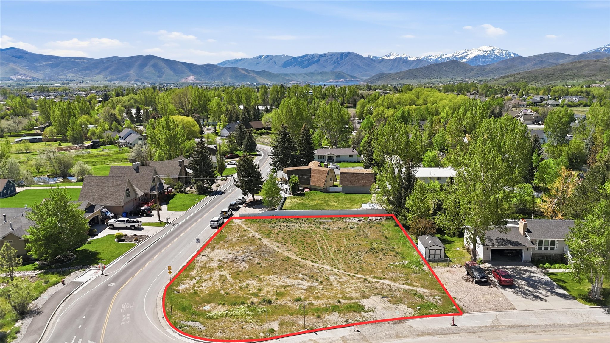 Expansive corner lot with mountain scenery