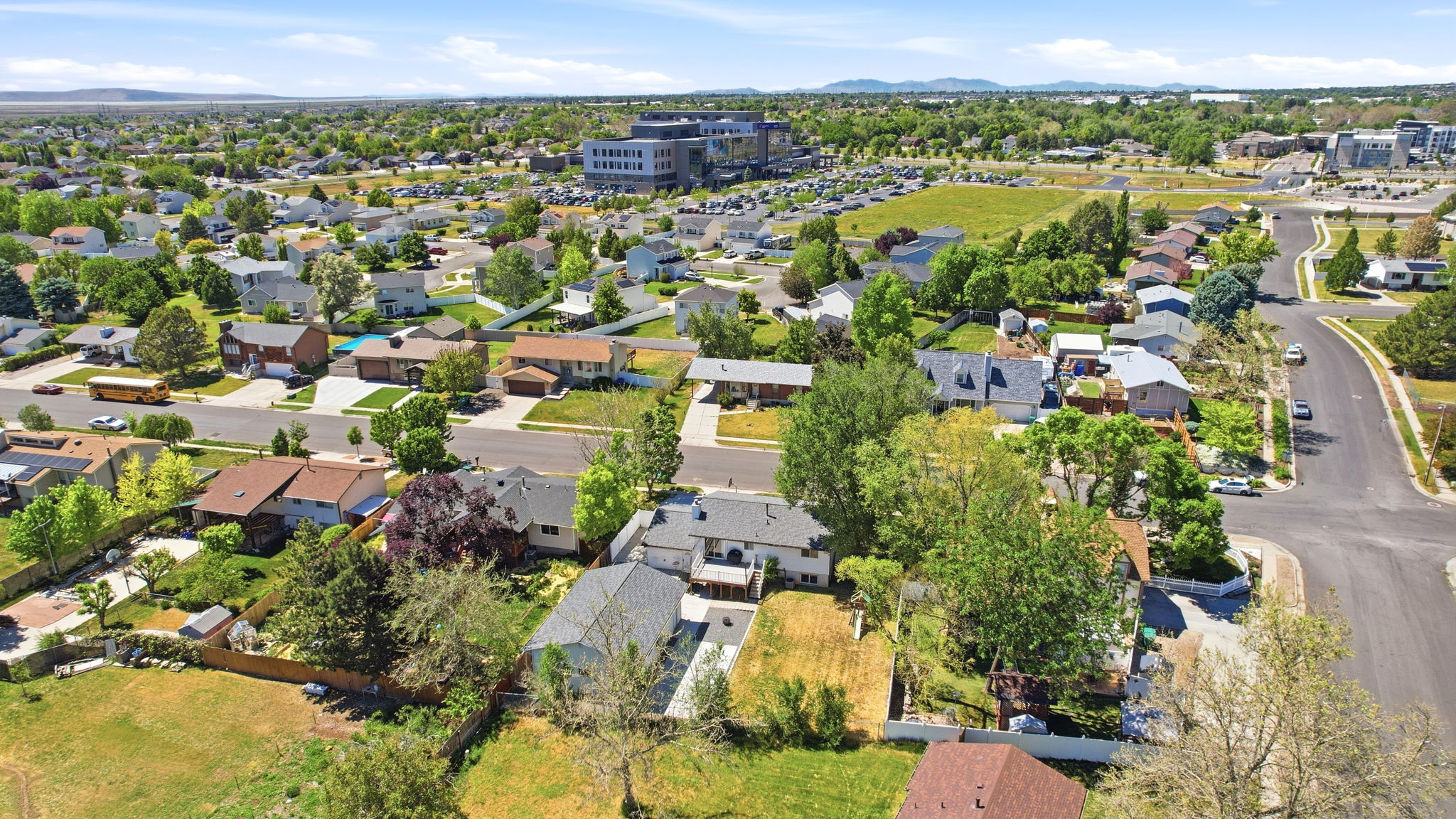 Residential neighborhood featuring diverse architectural styles and mature landscaping