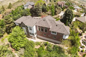 Expansive multi-level residence with a shingle roof