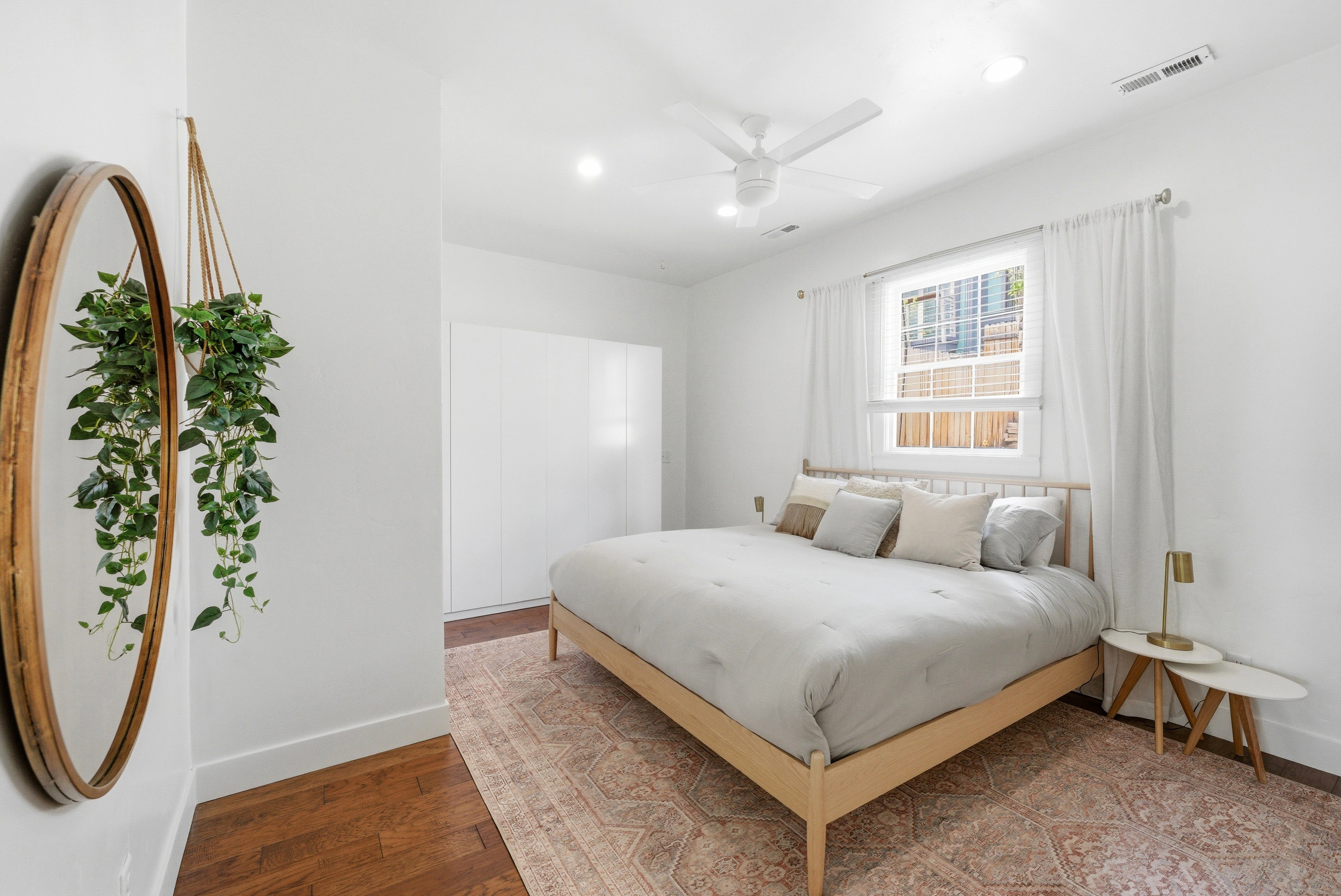 Bedroom featuring wood-finish flooring, recessed lighting, and a ceiling fan