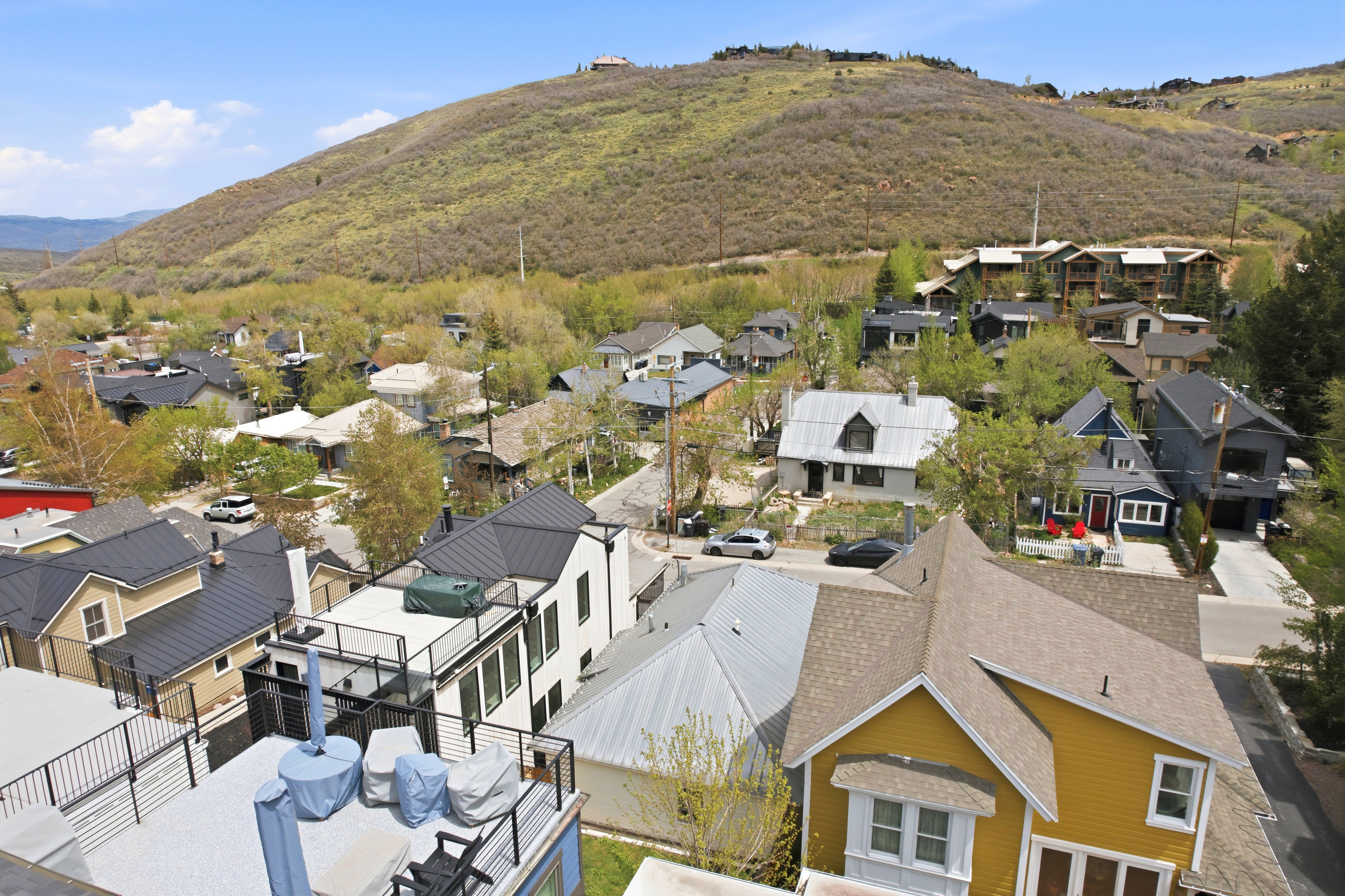 Neighborhood setting surrounded by natural terrain