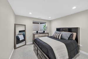 Neutral wall tones complement plush carpeting