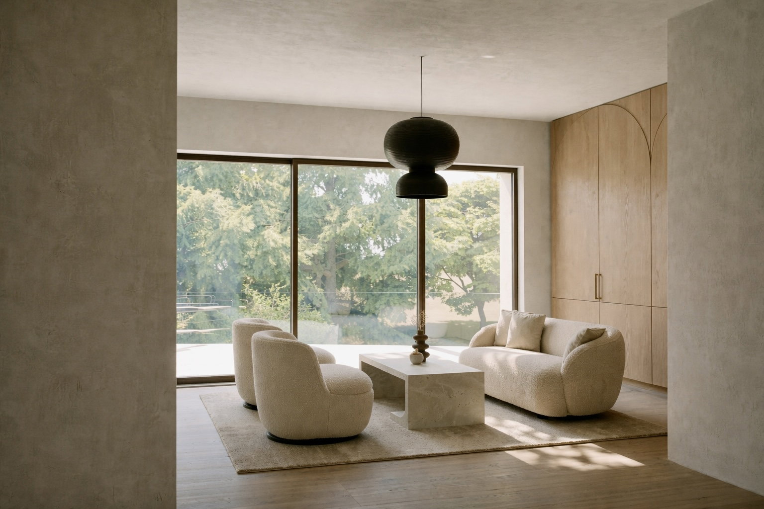 Contemporary living area featuring expansive floor-to-ceiling windows, natural wood-finish built-in cabinetry with unique detailing, and durable flooring