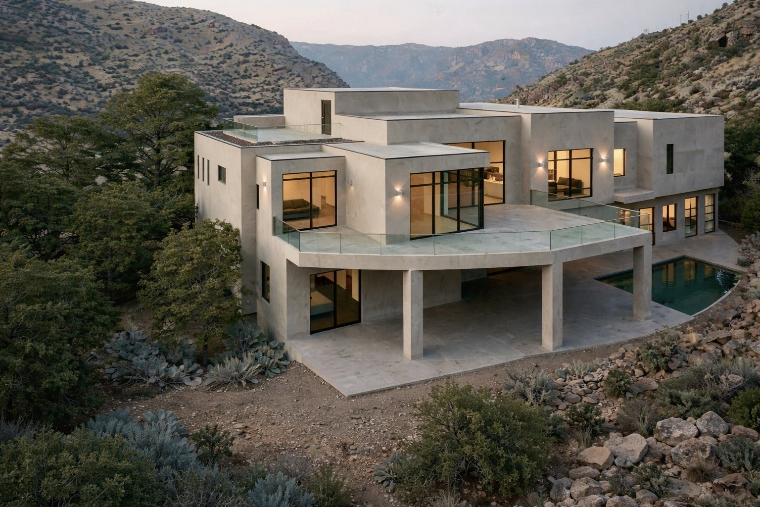 Modern multi-level residence featuring a stucco exterior and expansive window placement
