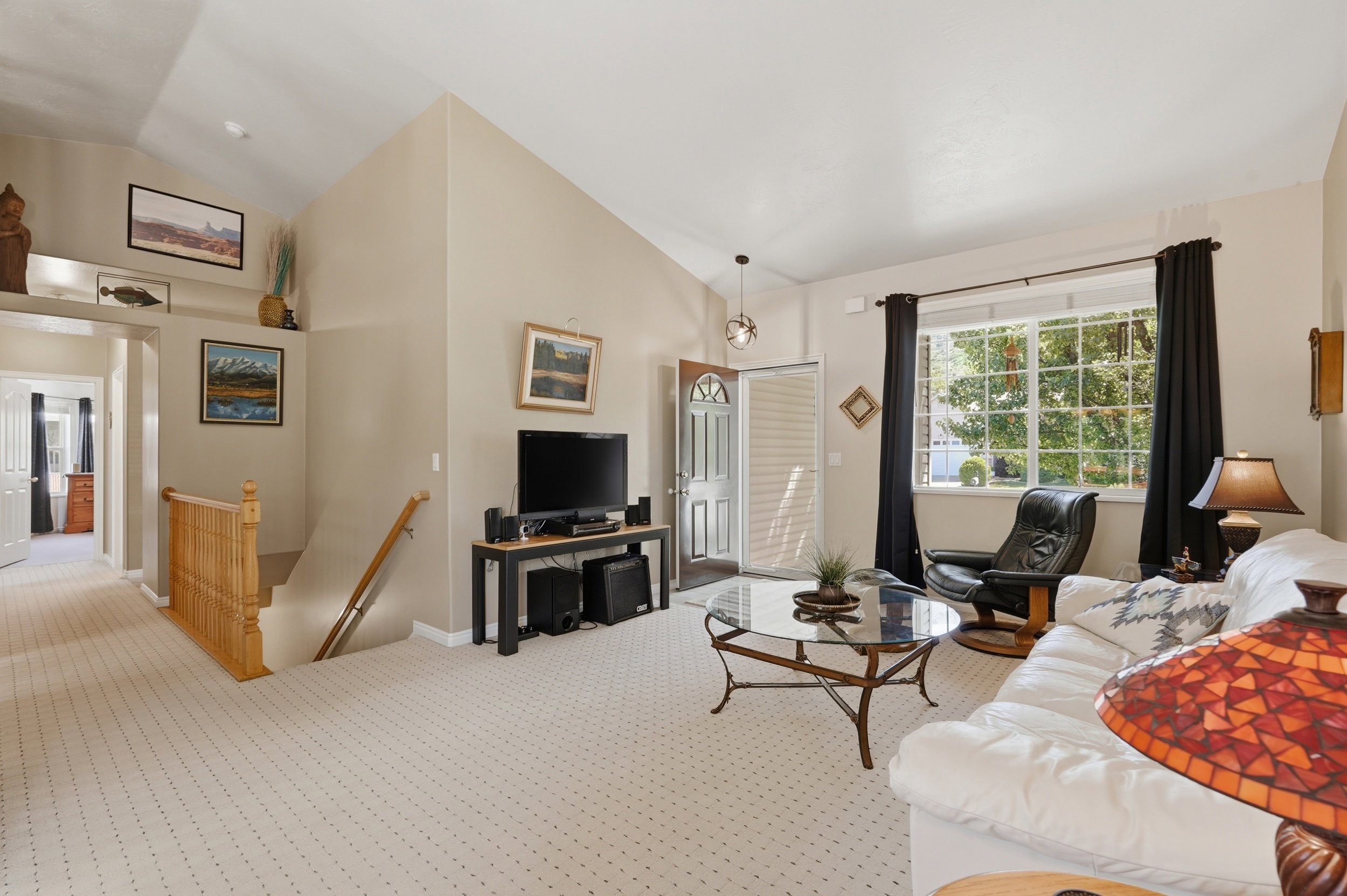 Main living area with vaulted ceilings