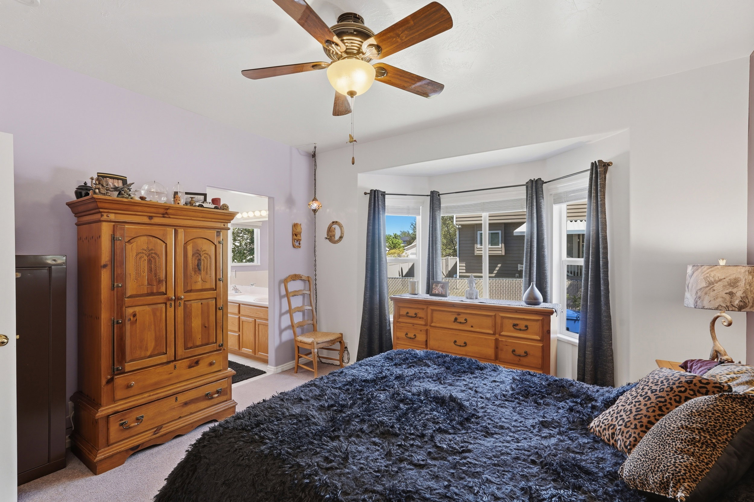 Bedroom featuring a bay window