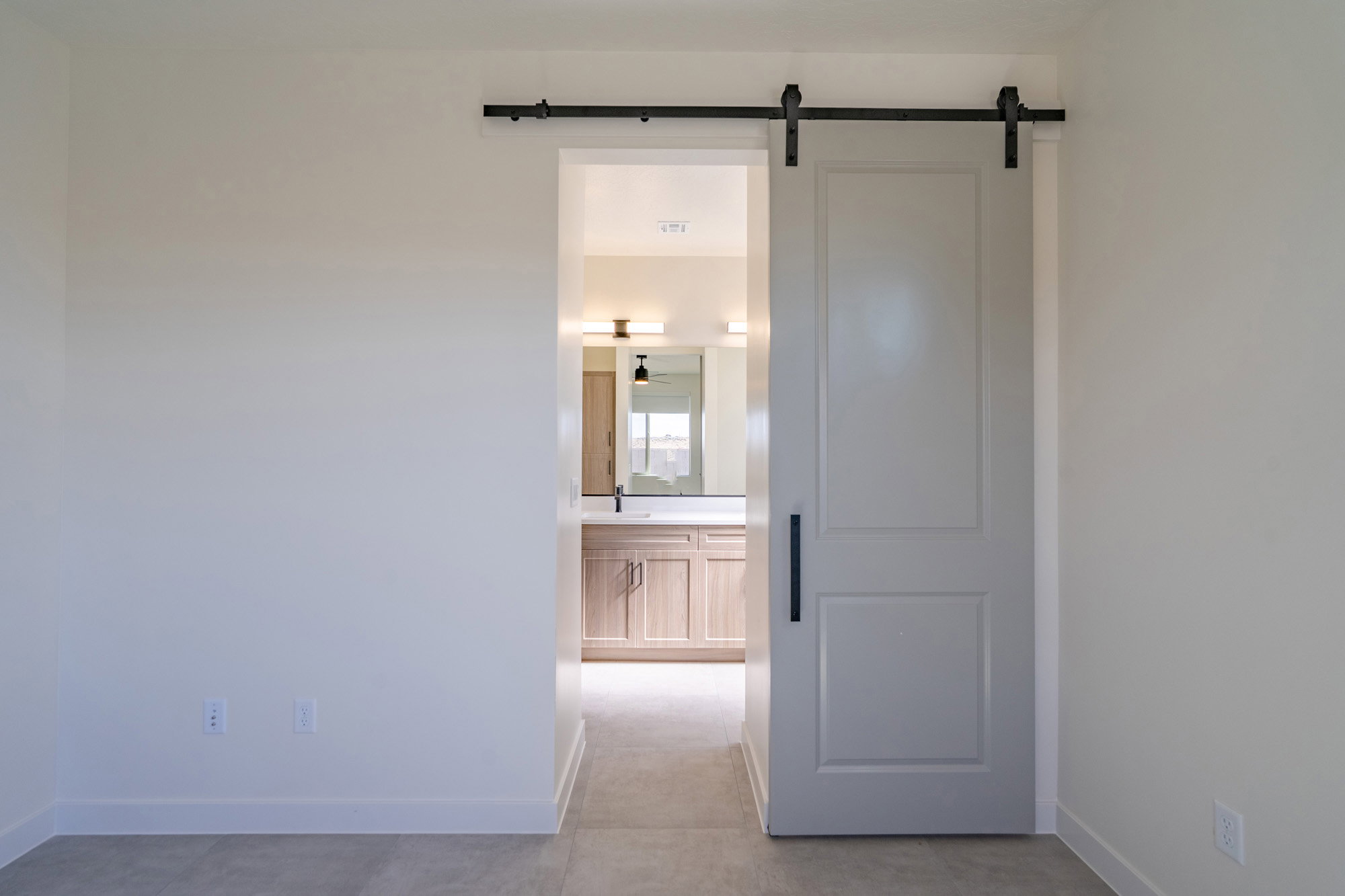 Sliding barn door with black hardware