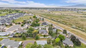 Expansive aerial perspective showcasing a residential area with varied housing styles