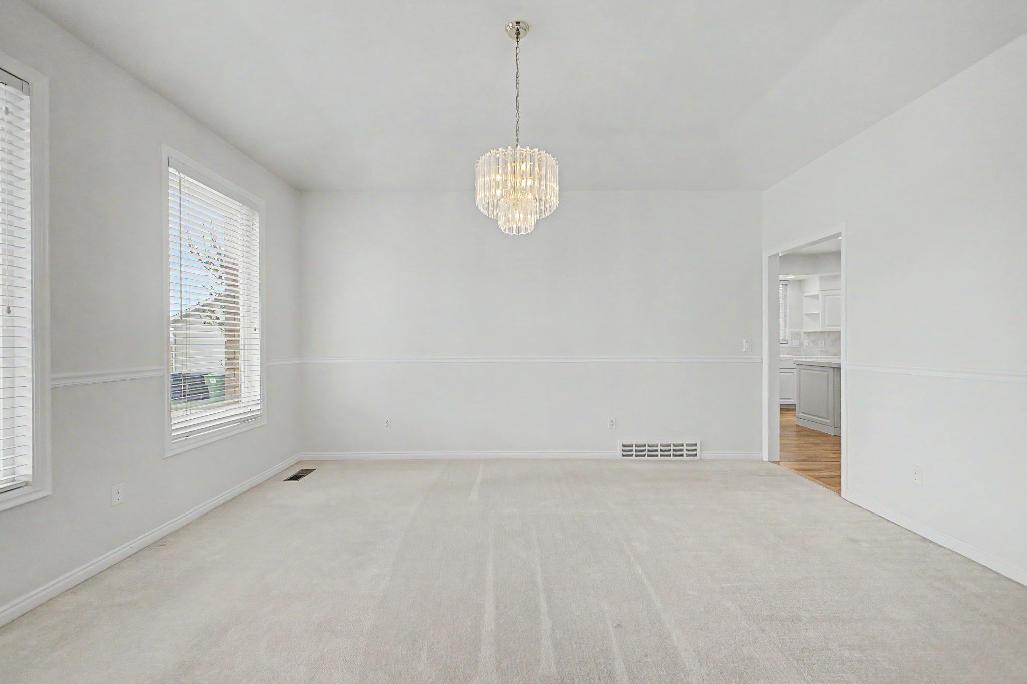 Neutral tone carpeting throughout