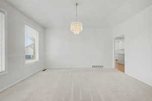 Neutral tone carpeting throughout