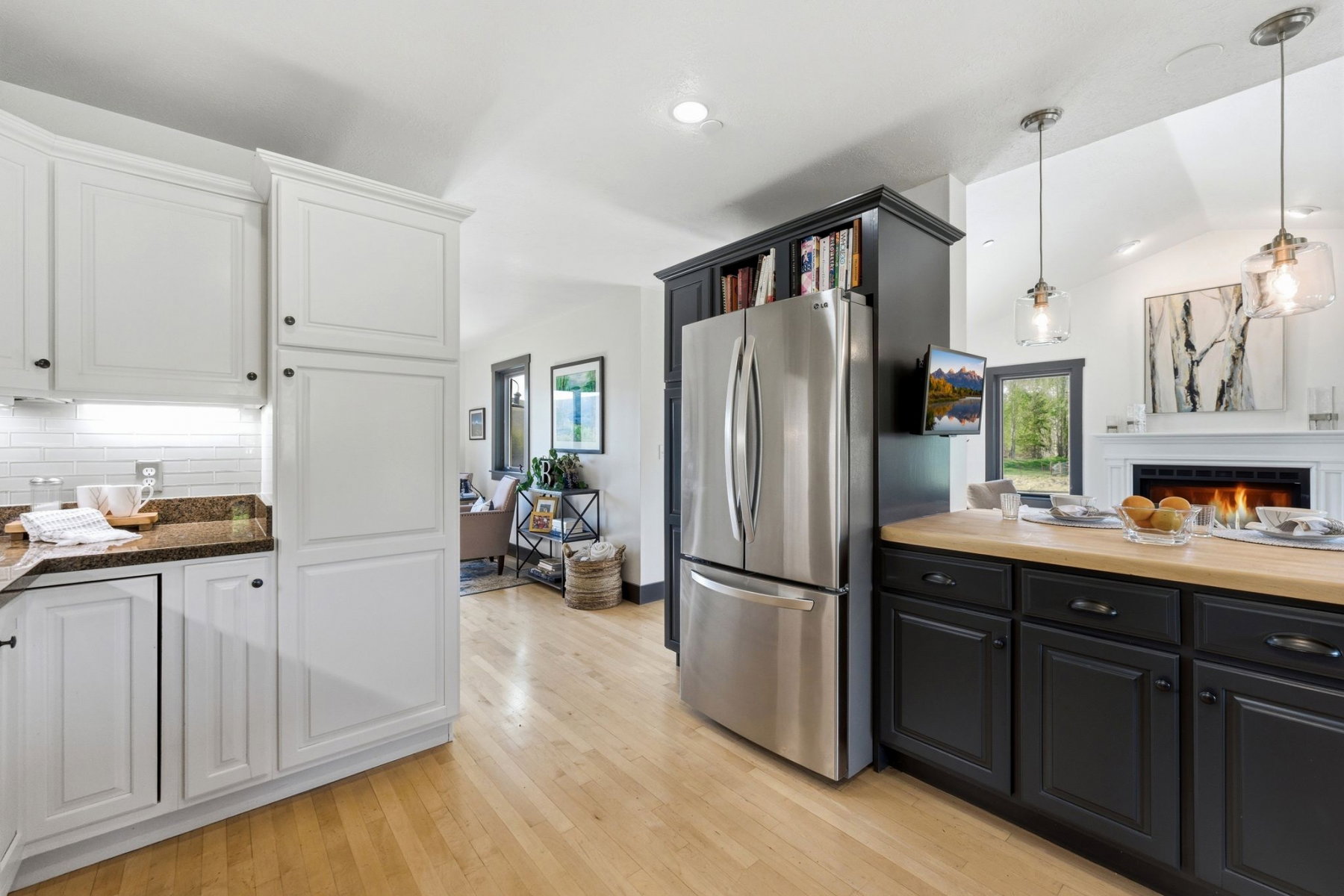 Modern kitchen with light wood-finish flooring