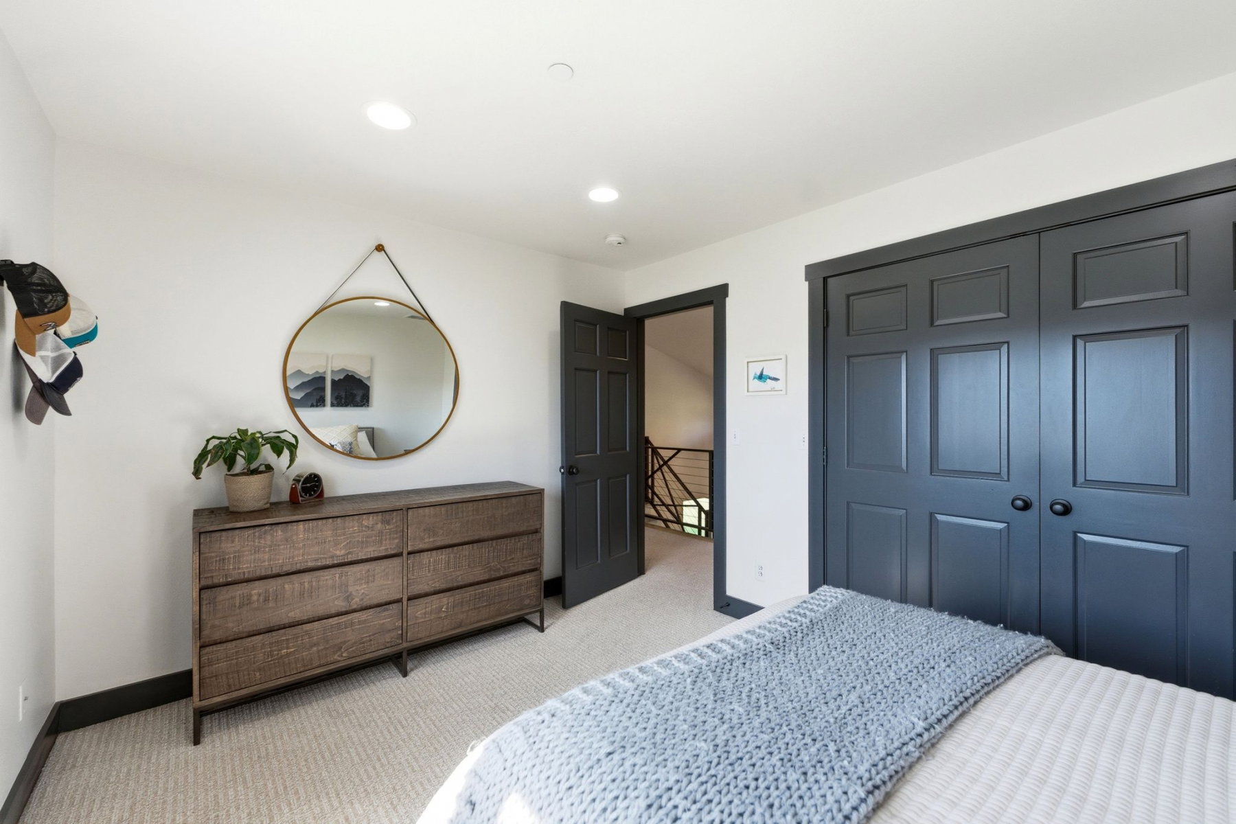 White walls with dark trim and doors